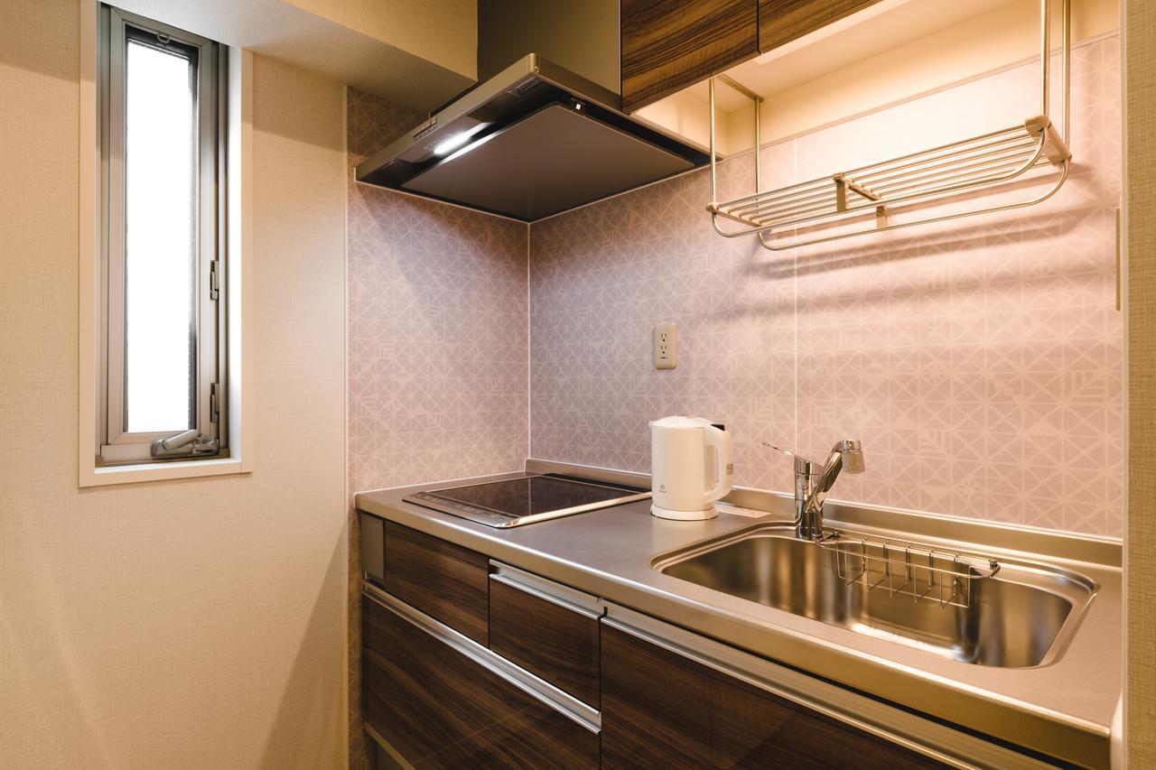 ทริป เบส ฮากาตะเอกิมาเอะ Aparthotel ฟูกุโอกะ ภายนอก รูปภาพ